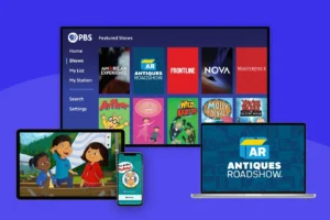 PBS streaming platform shown on TV displaying featured shows and menus. Portable devices below include a tablet with an animated children's program, a smartphone app screen with a similar program, and a laptop with the "Antiques Roadshow" show highlighted.